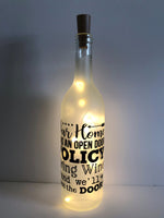 Our Home has an Open Door Policy Lighted Wine Bottle. Clear, Frosted, Cobalt Blue