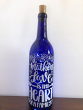 A Mother's Love Lighted Wine Bottle. Clear, Frosted, Cobalt Blue