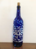 Our Home has an Open Door Policy Lighted Wine Bottle. Clear, Frosted, Cobalt Blue