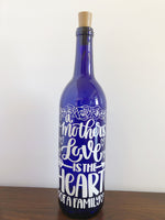 A Mother's Love Lighted Wine Bottle. Clear, Frosted, Cobalt Blue